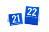 Standard restaurant table numbers in blue with white numbers. These tent style table numbers are ideal for any food service environment. www.citygrafx.com