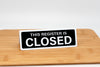 Register closed sign black with white text