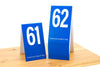 Tall table numbers in blue w/ white numbers.  www.citygrafx.com
