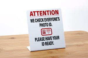 We Check Photo ID Counter Signs are perfect for use in retail, lottery, grocery and business environments.. Visit us at www.citygrafx.com.