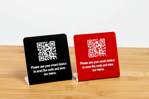 Engraved QR code signs. QR codes can link to menus or services. Ideal for use in restaurants, hotels and the customer service industry. www.citygrafx.com.
