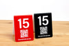 Engraved table numbers with a QR code are perfect for use in restaurants and the food service industry. QR codes are ideal for linking to menus or services offered. www.citygrafx.com