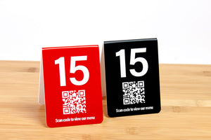 Engraved table numbers with a QR code are perfect for use in restaurants and the food service industry. QR codes are ideal for linking to menus or services offered. www.citygrafx.com