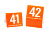 Standard table numbers in orange w/ white number. Tent style table numbers are ideal for the food service and restaurant industry. www.citygrafx.com