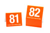 Standard table numbers in orange w/ white number. www.citygrafx.com