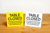 Small table closed signs for social distancing. www.citygrafx.com.