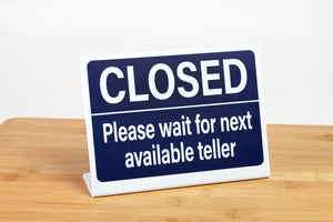 Bank teller signs are perfect for use in financial environments. These L style bank teller signs let customers know to wait for the next available teller. www.citygrafx.com