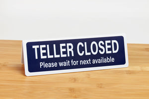 Bank teller signs are perfect for use in financial settings such as banks and credit unions. Bank teller closed signs feature bold white font on a navy blue background. www.citygrafx.com