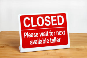 Bank teller signs are perfect for use in financial environments. These L style bank teller signs let customers know to wait for the next available teller. www.citygrafx.com